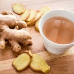 ginger root and cup of ginger tea